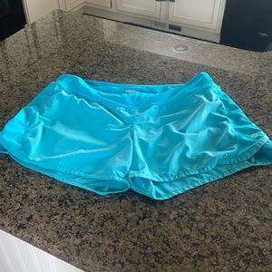 Blueish lululemon running shorts.